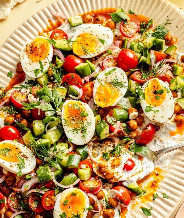 Spiced Chickpeas and Eggs with Herb Garlic Yogurt & Tomato Cucumber Salad